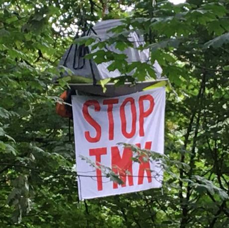 Dr. Takaro is suspended 25 metres up to stop the TMX pipeline expansion