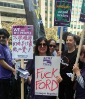 Janitors at Fight for $15 and Fairness rally