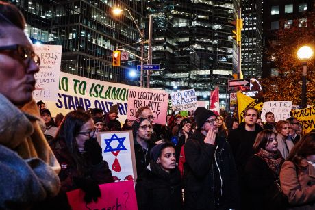 Protesters oppose Steve Bannon in Toronto