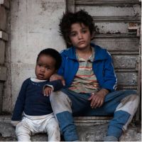 Still image from the film Capharnaüm showing two young children